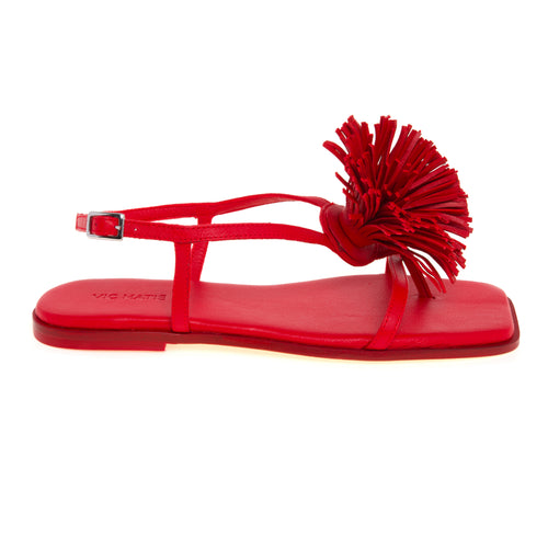 Sandalo flat Vic Matiè in pelle con maxi pon-pon con frange in pelle