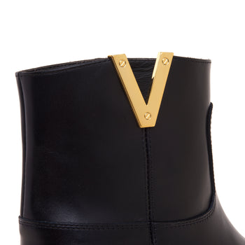 Tronchetto Via Roma 15 in pelle con accessorio a "V" in metallo - 4