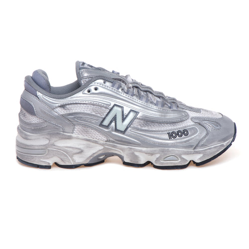 Sneaker New Balance 1000 in ecopelle e tessuto laminati effetto used