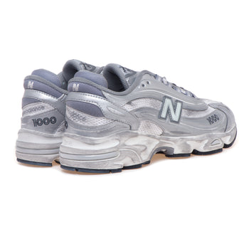 Sneaker New Balance 1000 in ecopelle e tessuto laminati effetto used - 3