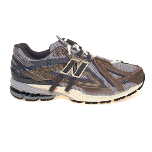 Sneaker New Balance 1906A in ecopelle, mesh e camoscio a pannelli sovrapposti